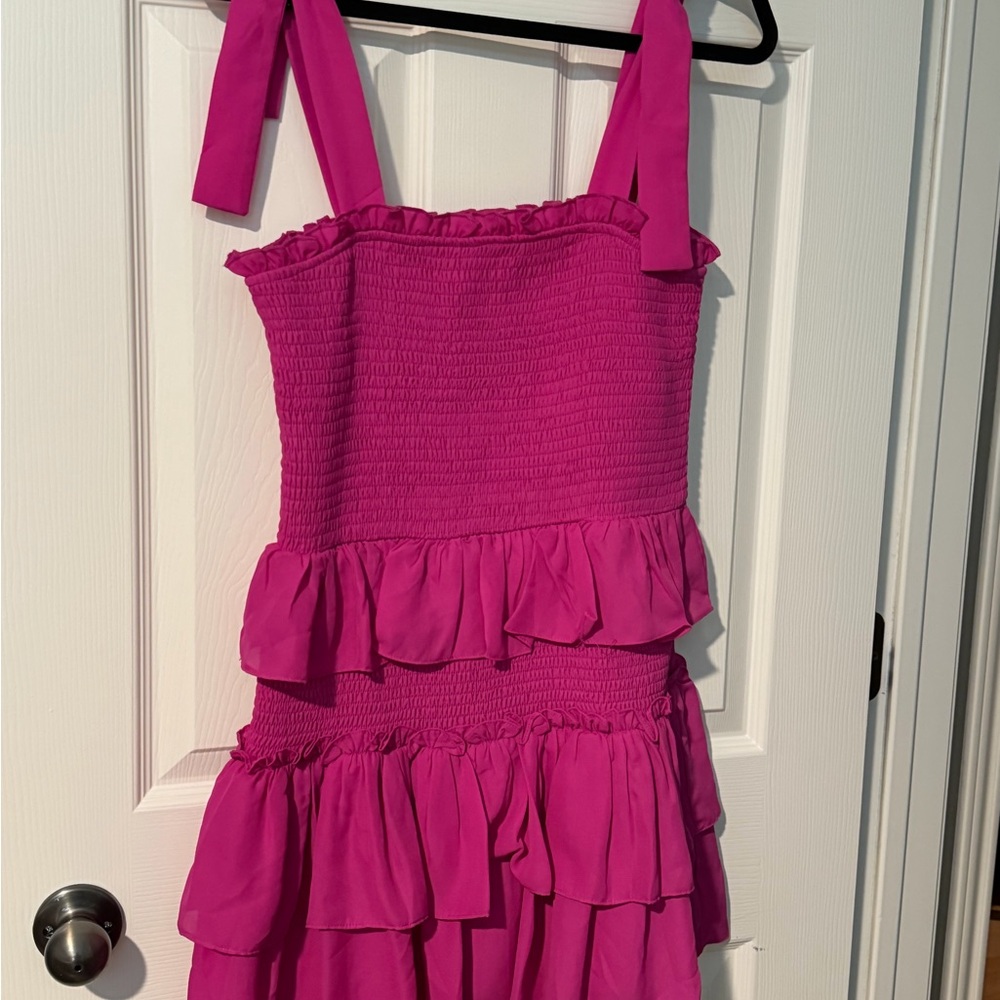 Pretty in Pink!  Lovely pink smocked dress perfect for an evening or an event.